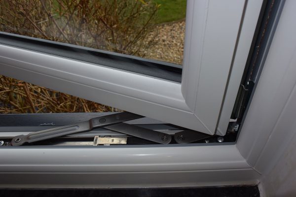 Sculptured white window hardware